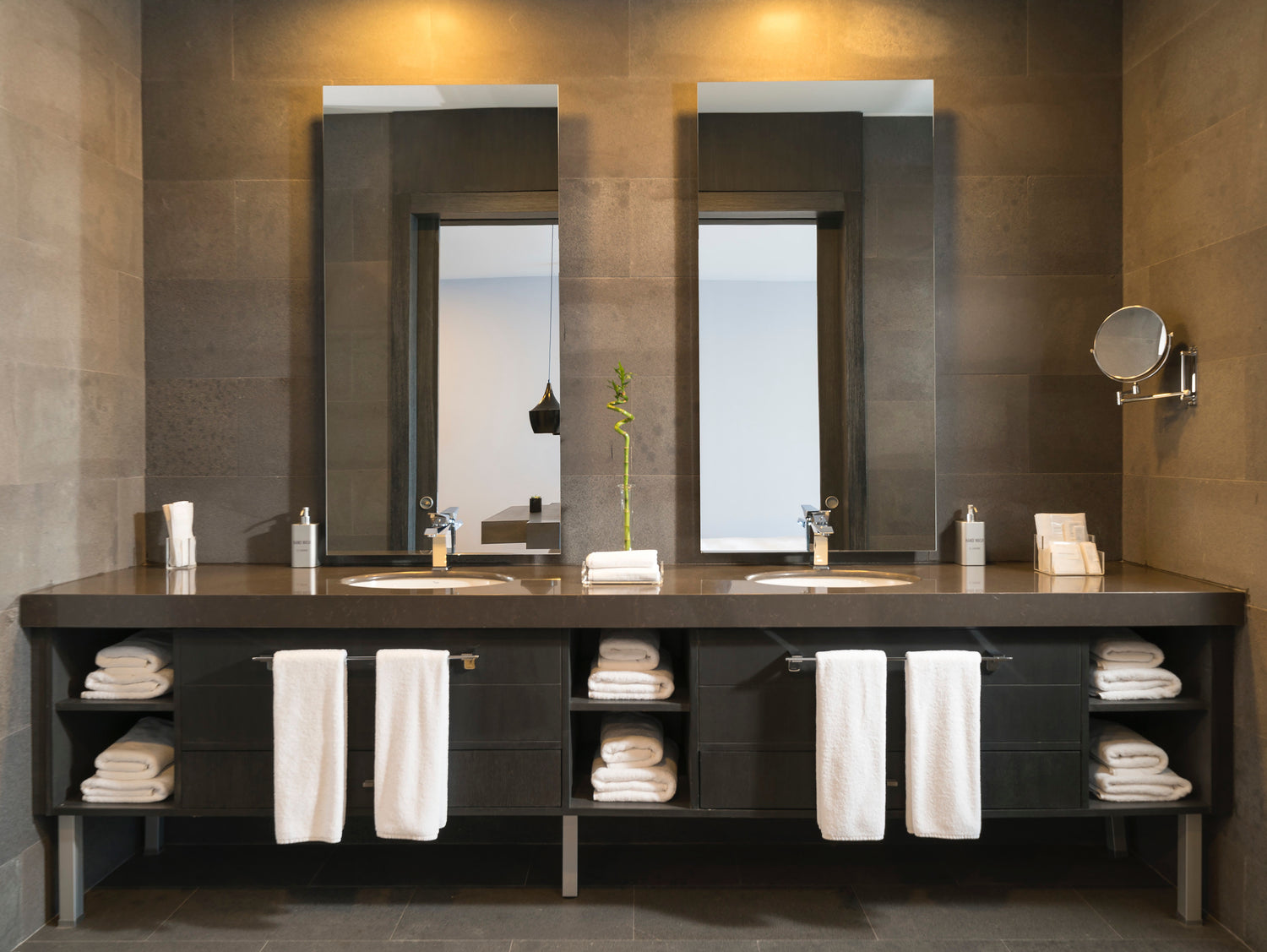 Interior designer curated bathroom with double vanity and natural finishes. Modern feel